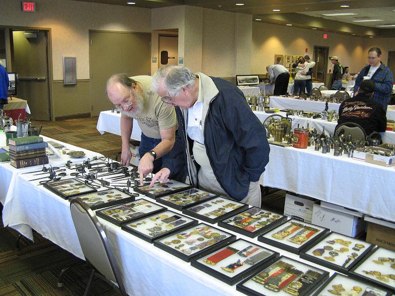CC 404 -Bill Collins and Tony Moon Checking Out Elks Badges.JPG